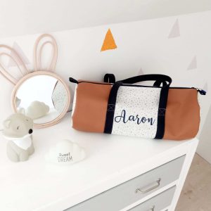 Sac polochon, simili camel, étoilés dorées