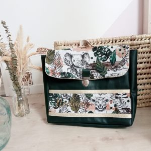 Cartable, simili sapin et jungle