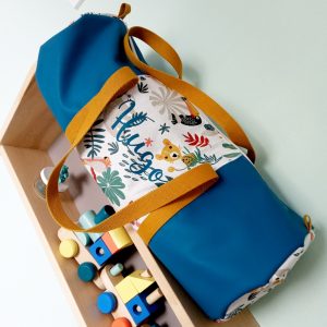 Sac polochon, simili bleu papaya